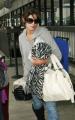 Ashley Greene jetting out of LAX Airport (1)